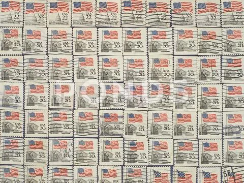 Postage stamps with the usa state flag. Stock Photos