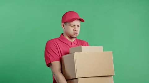 Postal Courier Man With Heavy Parcels Boxes. Postman Delivers Address Package Stockbeeldmateriaal 288038110