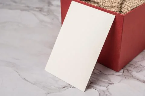 Postcard and red gift box in celebrate time Stock Photos