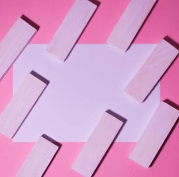Postcard on a pink background with a pattern of blocks. Stock Photos