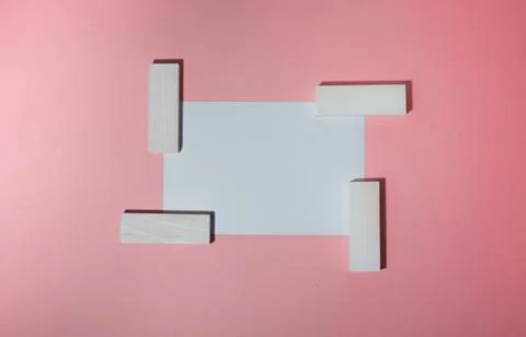 Postcard on a pink background with a pattern of blocks. Stock Photos