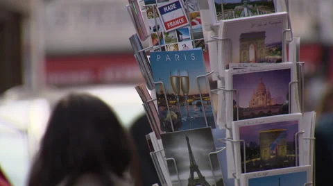 Postcards of Paris on a stand Stock Footage 59311547