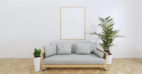 Poster above white sofa with frame in simple zen living room interior.3D Rend Ilustração Stock