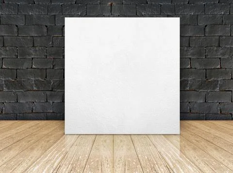 Poster frame at black brick wall and wooden floor Foto stock