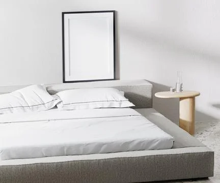 Poster frame with mat in room with bed and pillows and bedside table with whi Stock Illustration
