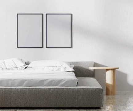 Poster frames mock up in bedroom interior, minimalist style, white wall, 3... Foto stock