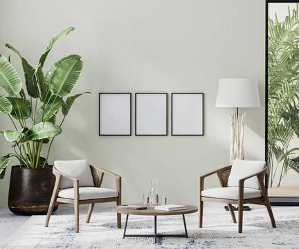 Poster frames in room interior with light neutral wall with sunlight and w... Foto stock