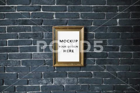 Poster mockup on a black wall PSD Template