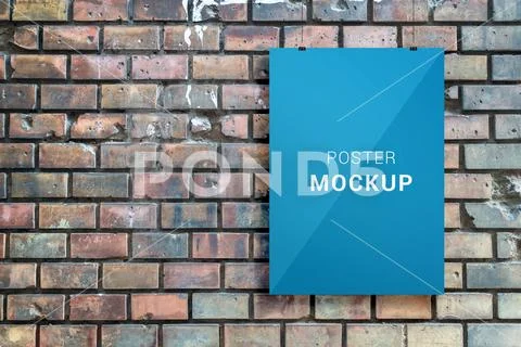 Poster mockup hangs in front of urban brick street wall PSD-Vorlage
