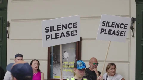 Poster with the text "Silence please!". Prague, Czech Republic - June 28, 2024 Stock Footage 278600666