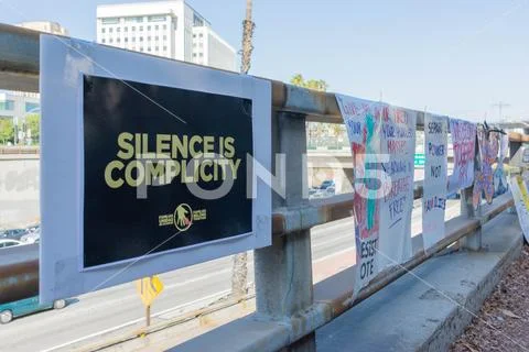 Posters around the Metropolitan Detention Center. Stock Photos