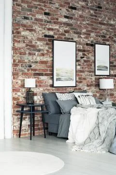 Posters on brick wall Stock-Fotos