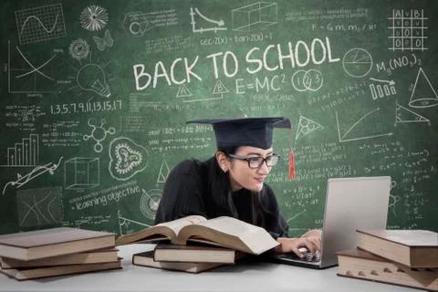 Postgraduate studying in class Stock Photos