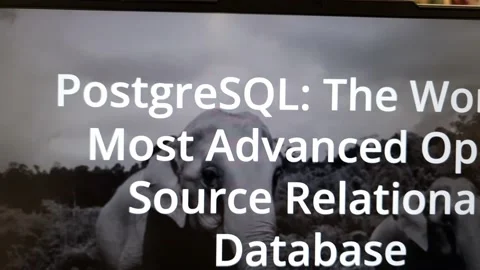 PostgreSQL website displayed on laptop computer Stock Footage 235859182