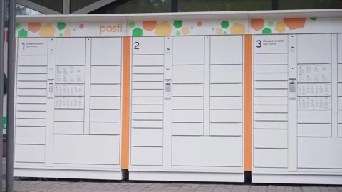Posti self-service parcel lockers installed outdoors in Hollola, Finland Stock Footage 313789509