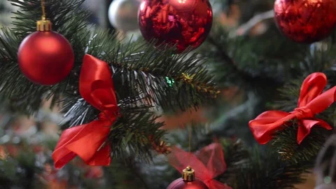 Posting a Christmas tree with decorations and pears. Stock Footage