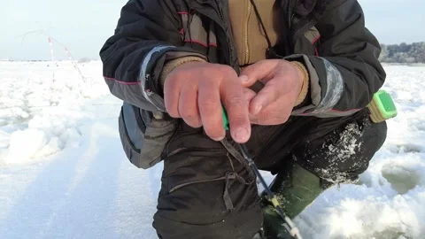Posting with a icefishing rod 動画素材 149101175
