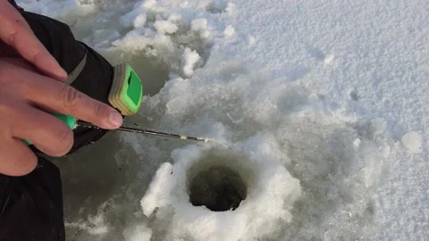 Posting with a icefishing rod 動画素材 149103120