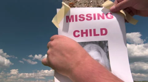 Posting photograph of missing child Stock Footage 40430098