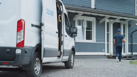 Postman Delivering Parcel Stock Footage 223201875