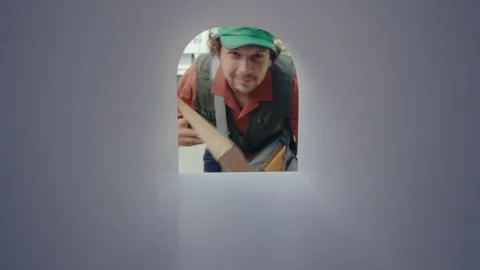 Postman Placing Parcel into Mailbox Stock Footage 236984303