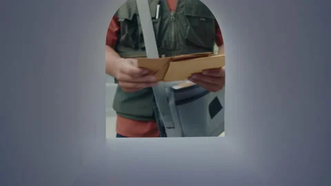 Postman Putting Letters into Mailbox and Walking Away Video stock 236984254