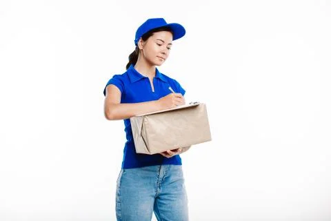 Postman signing documents for the parcel delivery. Stock Photos