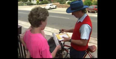 Postman Sorting and Delivering Mail – Australia (1990s) Stock Footage 318947349