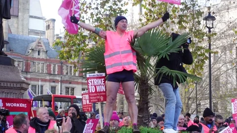 Postmen protest march at Parliament square over the future of Royal Mail Stock Footage 225910557
