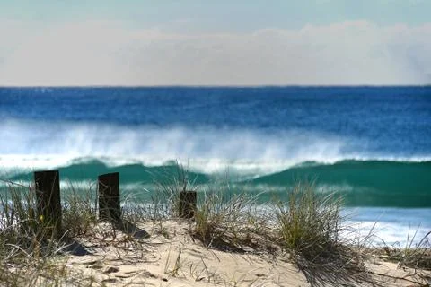 Posts on a pathway leading to the beach Stock Photos