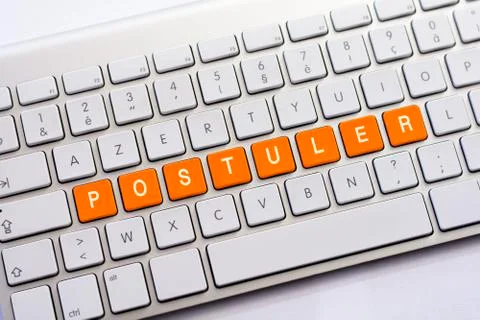 POSTULER writing on white keyboard Stock Photos