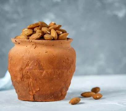 Pot of almonds Stock Photos