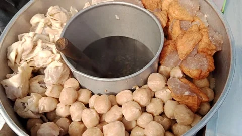 A pot of Bakwan Malang or bakwan kawi Stock Footage 295755872