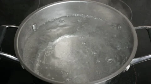 Pot of boiling water. Close-up in pot of boiling water,Bubbles of boiling water Stock Footage 147605841