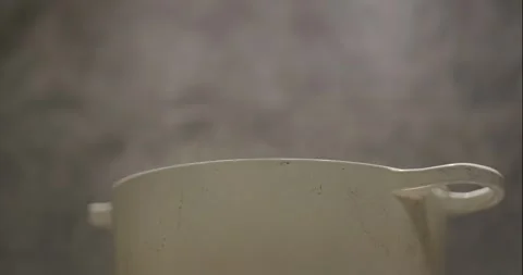 Pot On Burner Salt Added To Steaming Pot Stock Footage 261902216