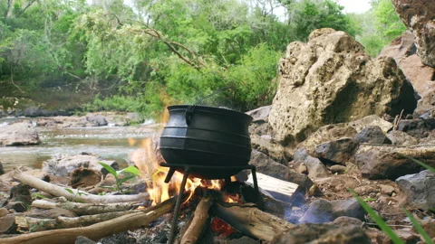 Pot on Fire by the River Stock Footage 132087007