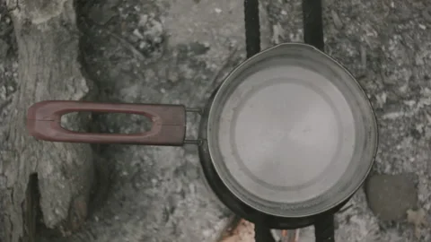 A pot on a fire, the water is boiling Stock Footage 139049119