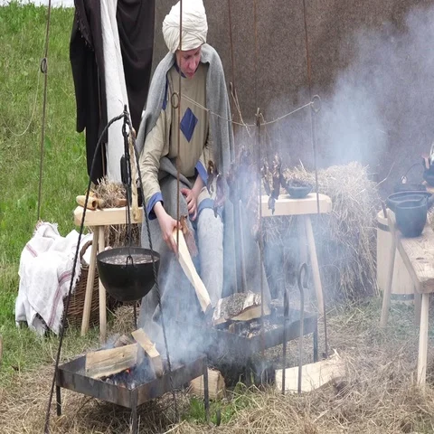 Pot with food on open fire Stock Footage 69734934