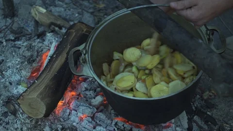 Pot of food at the stake Stock Footage 99781971