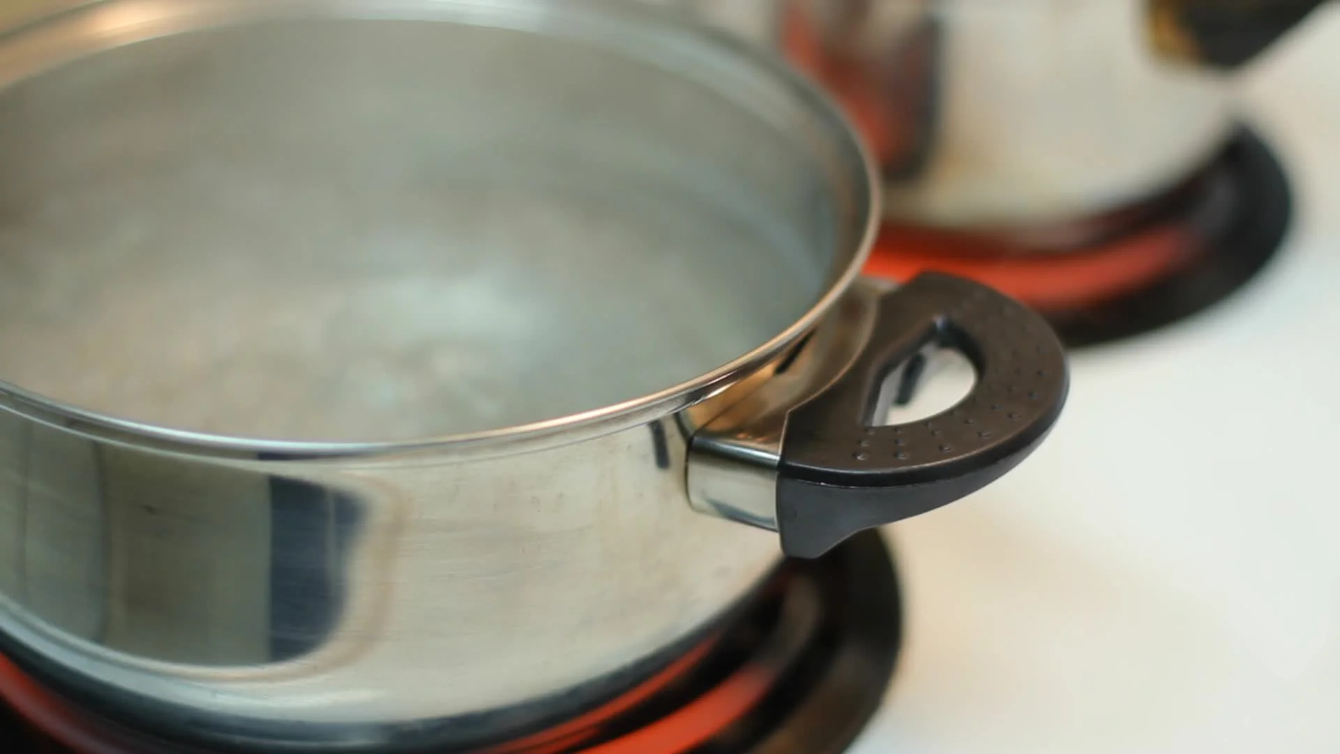 Pot full of boiling water stock footage. Video of cooking - 61664754