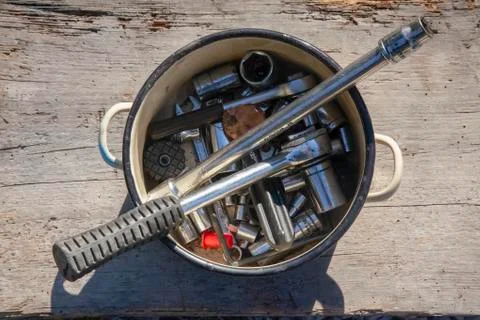 Pot full of tools on desk Stock Photos
