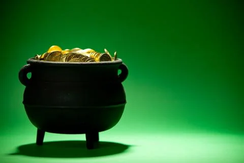 Pot of gold: side view of full pot Stock Photos