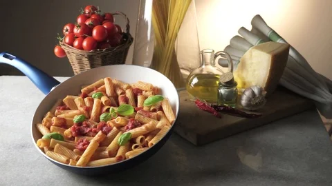 Pot with macaroni on the kitchen table 스톡 동영상 85595439