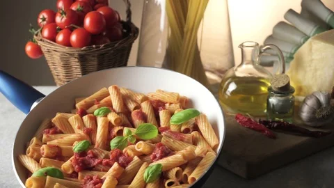 Pot with macaroni on the kitchen table Video stock 85595460