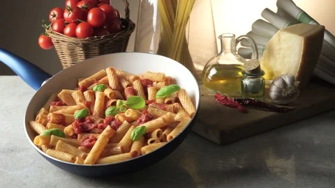 Pot with macaroni on the kitchen table Video stock 85595503