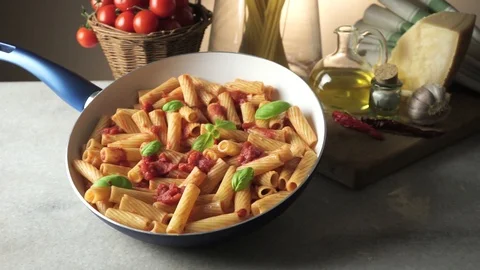 Pot with macaroni on the kitchen table Video stock 85595512