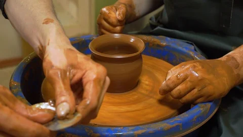 Pot maker using his hands makes pottery,at small home workshop. traditional pot  스톡 동영상 99772766