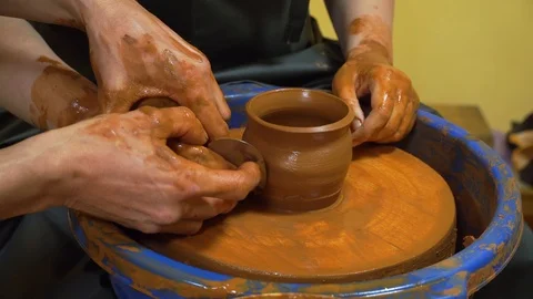 Pot maker using his hands makes pottery,at small home workshop. traditional pot  Video stock 99772808