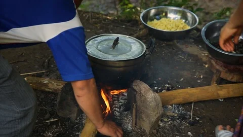 Pot over fire in traditional Lao style Stock Footage 104119882