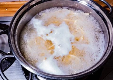 Pot with pasta boiling Stock Photos
